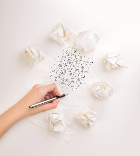 Writing hand in crumpled paper - Fotó, kép