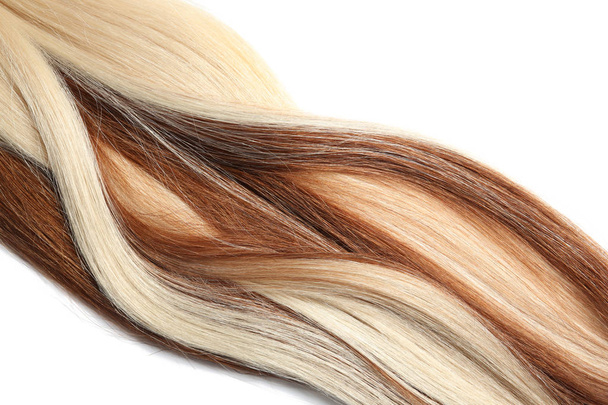 Пасма різного кольору волосся на білому тлі
 - Фото, зображення