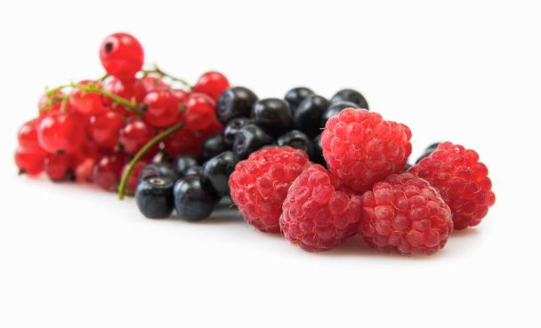 Mix of different berries isolated on white - Foto, afbeelding