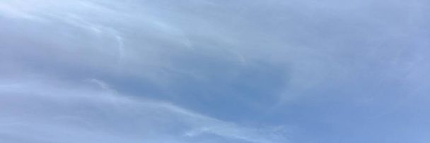Beauty cloud against a blue sky background. Clouds sky. Blue sky with cloudy weather, nature cloud. White clouds, blue sky and sun - Photo, Image