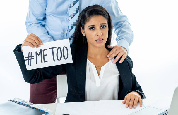 Me Too Harassment Campaign. Young businesswoman being sexually harass by her boss in the office holding a note with the text me too in stop sexual abuse women human rights concept. - Фото, изображение