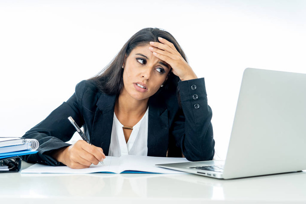 Young attractive businesswoman desperate and frustrated working on computer laptop at office in overtime and non fulfillment of ones hopes or professional expectations isolated on white - Φωτογραφία, εικόνα