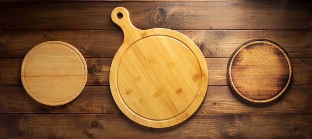 pizza or bread cutting board at wooden table, top view - Photo, Image