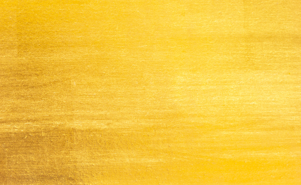 glanzend geel blad goud folie textuur achtergrond - Foto, afbeelding
