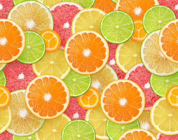 柑橘類の果実の背景。オレンジ、レモン、ライム、グレープフルーツとクムカットの作品とシームレスなパターン - 写真・画像