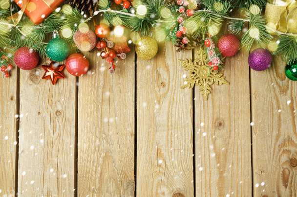Christmas holiday background decorations and ornaments on wooden table. Top view from above.  - Foto, Imagem