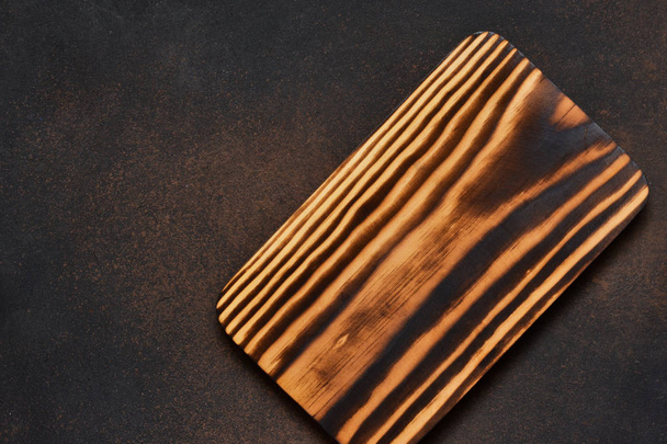 Photo background with a cutting board. Kitchen tools. - 写真・画像