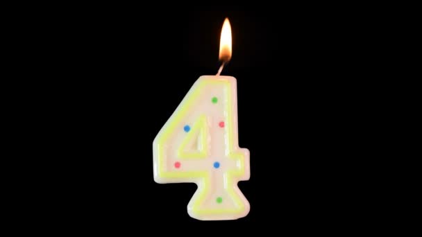 Wax candle in shape of number 4 burns. A nice addition to your birthday video. - Footage, Video