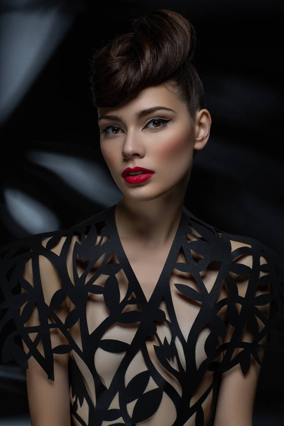 beautiful young woman with fancy hairdo and red lips - Fotoğraf, Görsel