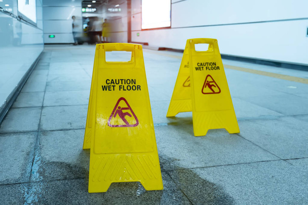 "Caution wet floor "sign
 - Фото, изображение