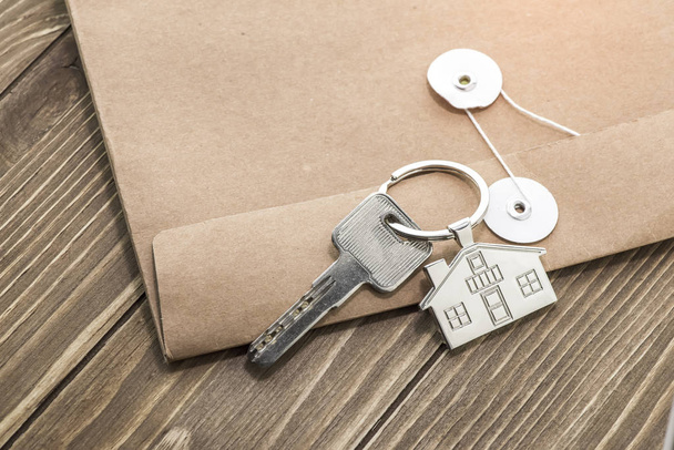 key chain with house symbol and key,Real estate concept - Photo, Image