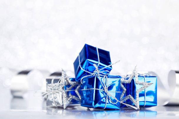 Christmas decoration on shiny silver glitter background - Фото, изображение