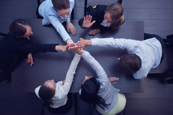 People with their hands together. Business team work concept - Фото, зображення