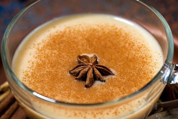 winter spicy masala tea in a glass cup, closeup horizontal - Foto, Imagen