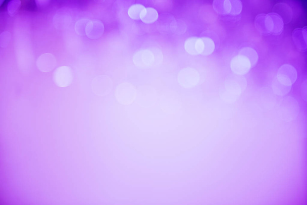 Stylish light violet background. Blurred glasses with bokeh - Photo, image