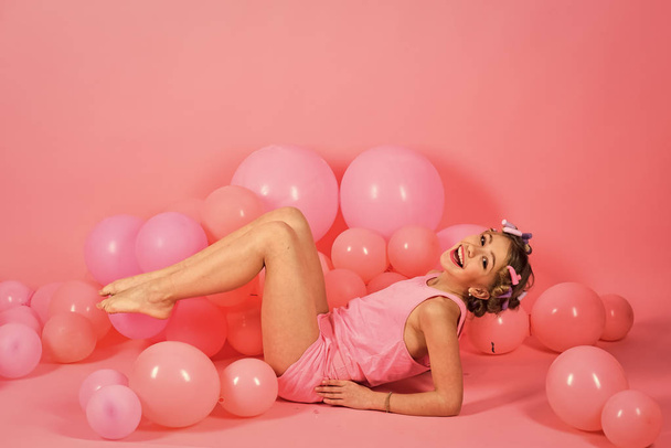 Party, holiday balloons on pink studio background. - Fotó, kép