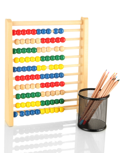 Bright wooden toy abacus and pencils, isolated on white - Photo, image