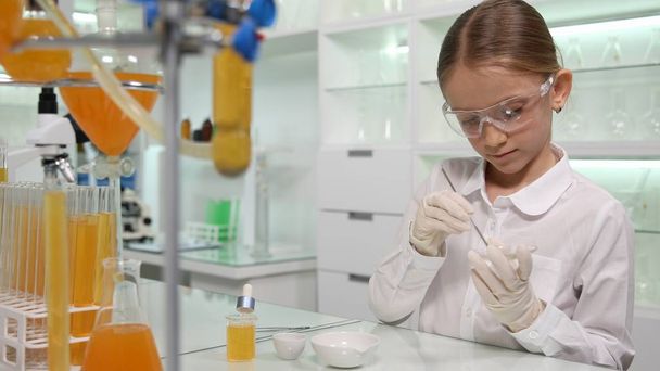 Child Making Chemical Experiment in School Lab, Student Girl in Science Class - Photo, image