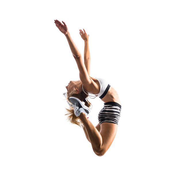 Jeune danseuse sautant sur blanc isolé
 - Photo, image