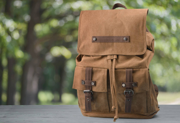 Brown backpack on a natural background, close up - Φωτογραφία, εικόνα