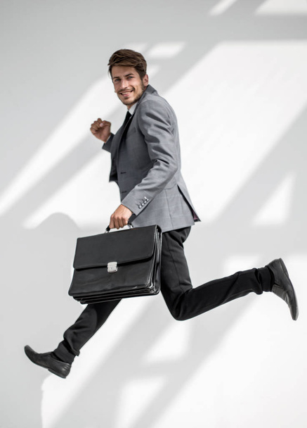 business man running on isolated white background, full length - Valokuva, kuva