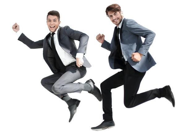two office manager in a joyous leap - Foto, afbeelding
