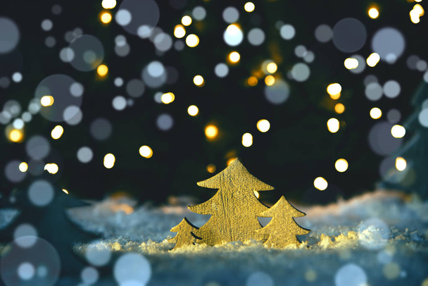 Wooden Christmas Trees, Snow, Blue Lights And Bokeh Background - Foto, imagen