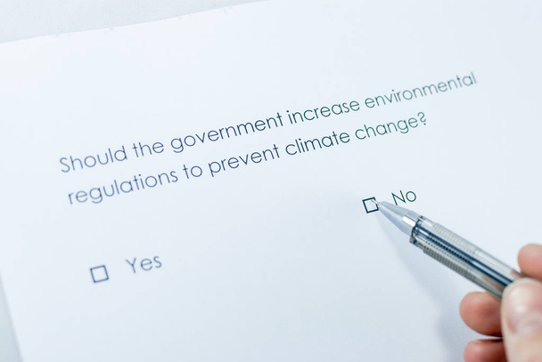 Should the government increase environmental regulations to prevent climate change? - Photo, Image