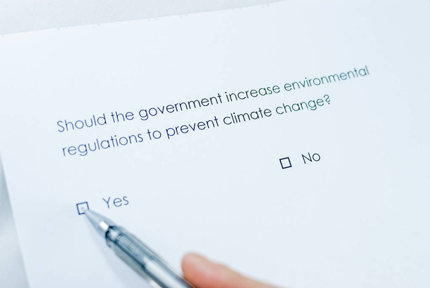 Should the government increase environmental regulations to prevent climate change? - Photo, Image