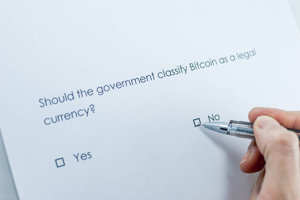 Should the government classify Bitcoin as a legal currency? - Photo, Image