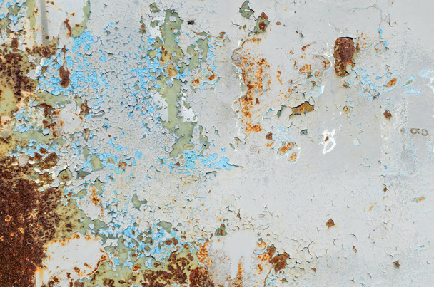 Old cracked paint on rusty metal plate. - Φωτογραφία, εικόνα