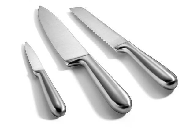 trois couteaux en acier inoxydable isokés sur blanc
 - Photo, image