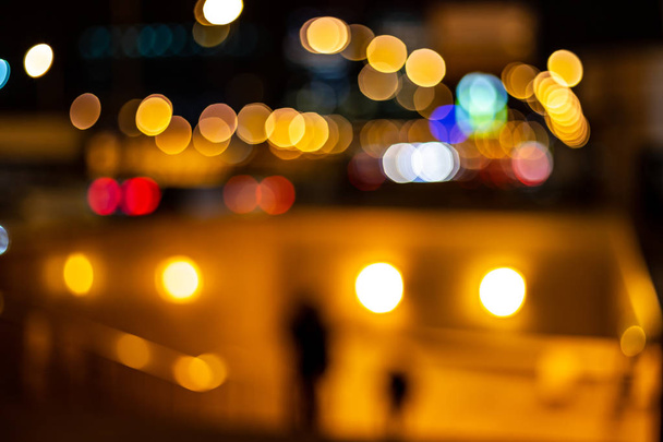 Abstract background. Blurred traffic and city lights bokeh. Urban mood - Photo, Image
