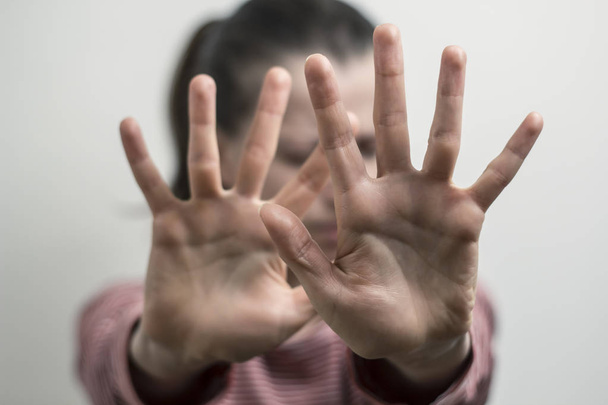 close up of a young man showing hands - Фото, изображение