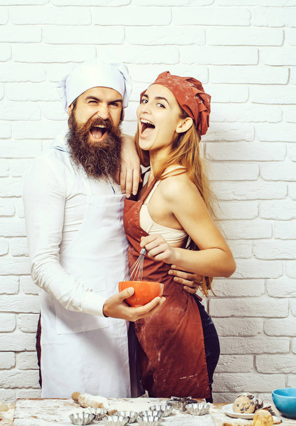 Excited cook and pretty girl - Photo, image