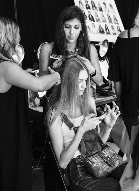 New York, NY - September 06, 2018: Sarah Berger prepares backstage for the Tadashi Shoji Spring Summer 2019 fashion show during New York Fashion Week Women's - Photo, Image