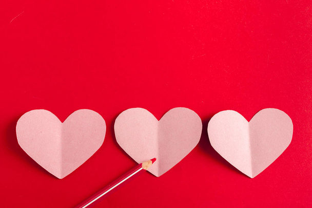 Beautiful paper hearts at table - Fotografie, Obrázek