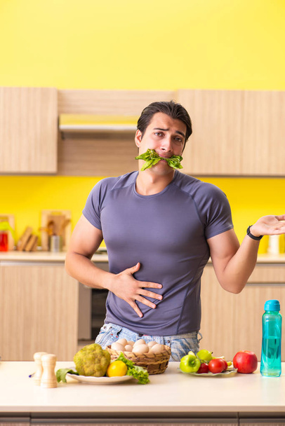 Young man in dieting and healthy eating concept - Foto, Imagem