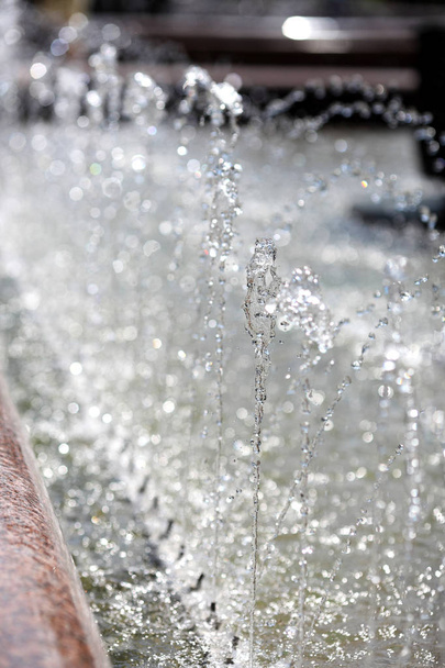 Splash of water in the fountain, abstract image. - Photo, Image