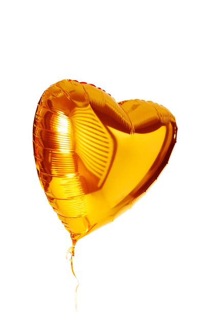 gold big heart metallic balloon isolated on white - Photo, image