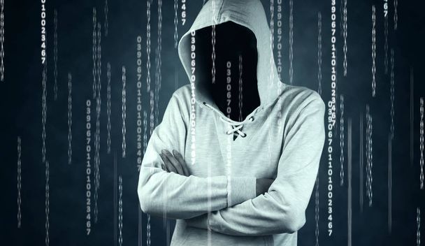 hacker isloated op zwart met binaire codes op achtergrond - Foto, afbeelding
