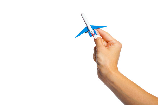 hand holding airplane toy model isolated on white background - Фото, зображення