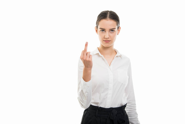 Retrato de mujer joven bastante bussines mostrando gesto dedo medio aislado sobre fondo blanco con área de publicidad copyspace
 - Foto, Imagen