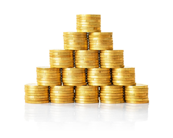 A pyramid of golden coins on a whithe background - Photo, Image