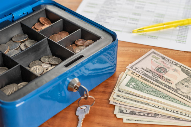 A cash box with banknotes and coins - Photo, Image