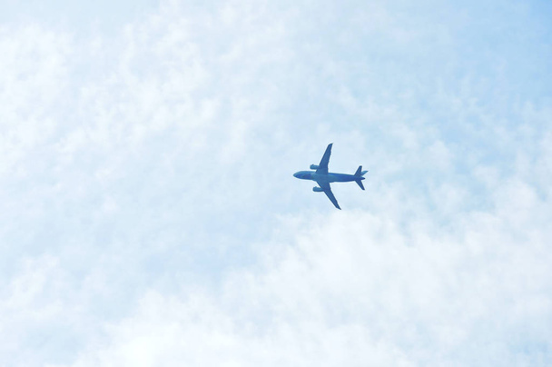 Airplane flying in the blue sky  - Φωτογραφία, εικόνα