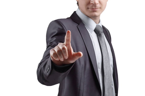 close up. businessman presses his finger on the virtual point. isolated on grey background - Фото, изображение