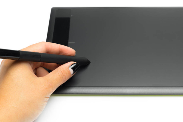 Graphic tablet with pen and hand for illustrators and designers, isolated on white background - Foto, Imagem