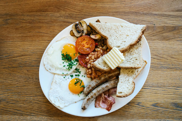 Traditional English breakfast. National food. A famous dish all over the world. - Фото, изображение