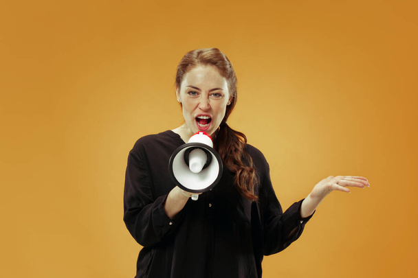 Woman making announcement with megaphone - Photo, Image